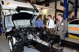 An autogas center tech with Stephen Holland (center) of Blossman Services and Ed Hoffman (right), president of Blossman Services.