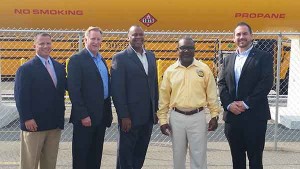 Pictured in front of ABC Student Transportation's 12,000-gallon propane tank, from left: Roush CleanTech's Todd Mouw, Blue Bird's Blue Flame Propane's John Foster, Detroit Public Schools' James Minnick, ABC Student Transportation's Brian Flaggs, and Blue Bird's Ryan Zic