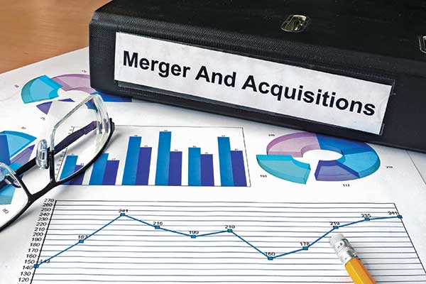 Mergers and acquisitions. Photo: designer491/iStock / Getty Images Plus/Getty Images