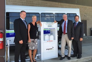 From left: Joe Thompson, president of Roush CleanTech; Jennifer Cohan, Delaware Department of Transportation secretary; Bob Zola, president of Sharp Energy; John Sisson, CEO of Delaware Transit Corp. (DTC). Photo courtesy of Roush CleanTech.