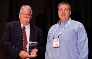 Travis Snellings (left), general manager of Van Go Transportation poses with Ed Hoffman, president of Blossman Services. Photo courtesy of Alliance AutoGas