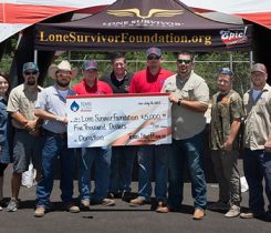 Texas Star Propane team members present a check to the Lone Survivor Foundation. Photo courtesy of Texas Star Propane