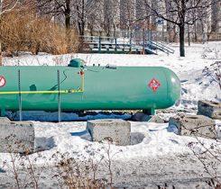 green propane tank. Photo: iStock.com/AlbertPego