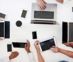 business table. technology. Photo: iStock.com/monkeybusinessimages