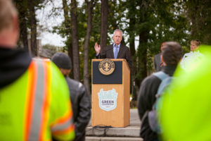 Louisville mayor Greg Fischer accepting the $5,000 donation from PERC. Photo courtesy of PERC. 