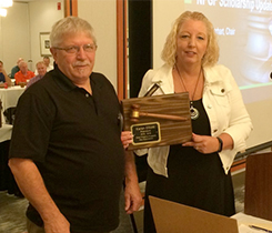 Incoming president Randy Hagedorn presents a certificate of appreciation to outgoing president Karen Elliott. Photo courtesy of WVPGA. 