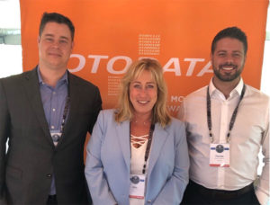 Rita Pecilunas, center, wil now serve as a business development consultant for Otodata. Photo courtesy of Otodata.