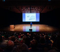 Vice president Aaron Cargas delivering the keynote presentation to attendees at the Ware Center. Photo courtesy of Cargas