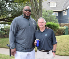 Pros4Care golf benefit photo of former NFL offensive lineman Flozell Adams and Ed Varney of RegO