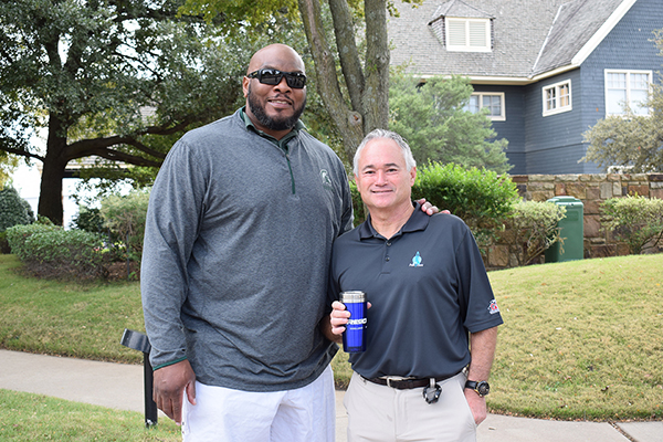 Pros4Care golf benefit photo of former NFL offensive lineman Flozell Adams and Ed Varney of RegO