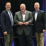 From left are Greg Zilberfarb, representing the Propane Education & Research Council (PERC); Richard Jones, representing Davidson County Transportation System in North Carolina; and Happy Fox, representing Alliance AutoGas. PERC honored Davidson County, an Alliance AutoGas customer, at BusCon for its sustainability efforts. Photo courtesy of Alliance AutoGas