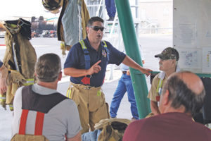 Mark Holloway, AmeriGas safety manager and former volunteer fire chief, engaged first responders and LPG pros prior to a live fire training that took place June 2012. Photo by Larry Dombrowski/Logica 3