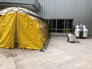 Bourne's Energy sets up a propane-powered heater for an outdoor facility at the University of Vermont Medical Center in Burlington. Photo by Jim Kurrle and Sharon Ferland