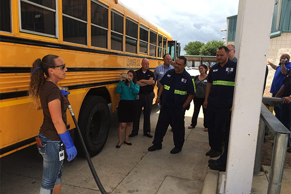 Bus fueling photo by Judy Fort, Lone Star Clean Fuels