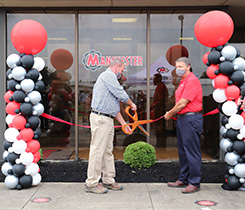 Corrie Eifert, senior general manager of Manchester Tank Quincy (left), and Robert Kotarba, general manager of Manchester Tank Campbellsville, cut the ribbon at the ceremony. Photo: Manchester Tank