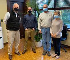 From left are Tom Corbett and Griffin Sharp of Dead River, and Bob and Deb Fortier of Fortier & Son. Photo by Jeff Brunner