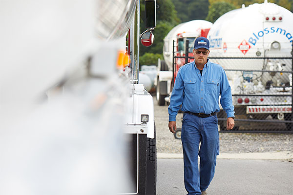 A Blossman Gas transport driver delivers renewable propane. Photo courtesy of Blossman Gas