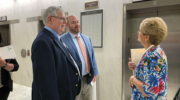 Michael Baker, center, accompanies Joe and Rosie Buschur of Ohio to meetings with their representatives. (Photo by LP Gas staff)