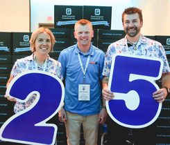 Nancy Mathison and Freddie Ridler stand on either side of Tony Smith from FRF Productions who lives streams the event. (Photo courtesy of RCC)