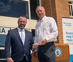 Dennis Ryan, coordinator of transportation at North Penn School District, left, accepts the Energy for Everyone Hero Award from Steve Whaley, director of autogas business development at the Propane Education & Research Council. (Photo: PERC)