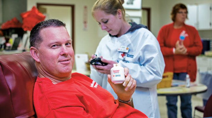 Eckler donates blood in Albany, New York. (Photos courtesy of Brand-News-Team/Roger Rosenbaum)