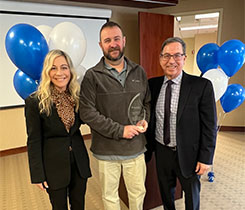 Christina, COO, and Joe Armentano, CEO award Scott Tucker, operations process manager in Saugerties, New York the Pat Armentano Legacy Award. (Photo by Luize Dalla Costa)