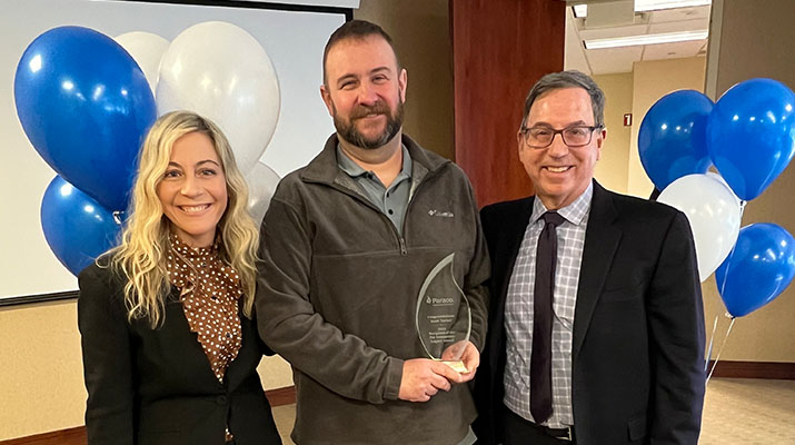 Christina Armentano, COO, and Joe Armentano, CEO, award Scott Tucker, operations process manager in Saugerties, New York, the Pat Armentano Legacy Award. (Photo by Luize Dalla Costa)