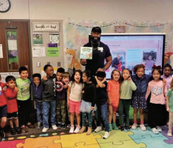 William Rackley III, former NFL player and illustrator of “A Girl Named Matter,” connects with students through the EspriGas Literacy Ambassador Program. (Photo courtesy of EspriGas)