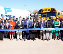 Photo of a ribbon-cutting celebrating the School District of Philadelphia's new propane-powered buses