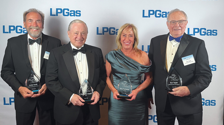 The inductees, from left: Walter Smith (Smith Pumps and Full-Circle), Tom Knauff (EDP), Rita Pecilunas (Otodata) and Ken Taylor (White Mountain Oil & Propane). (Photo by LP Gas staff)