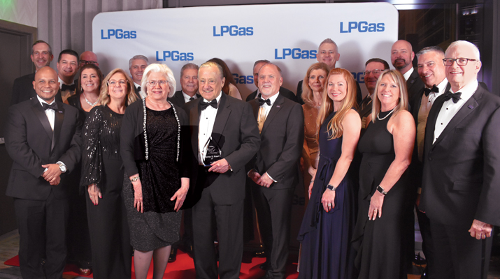 Inductee Tom Knauff and his wife, Janet, surrounded by the EDP team, all showing strong support for the company’s founder and leader. (Photo by LP Gas staff)