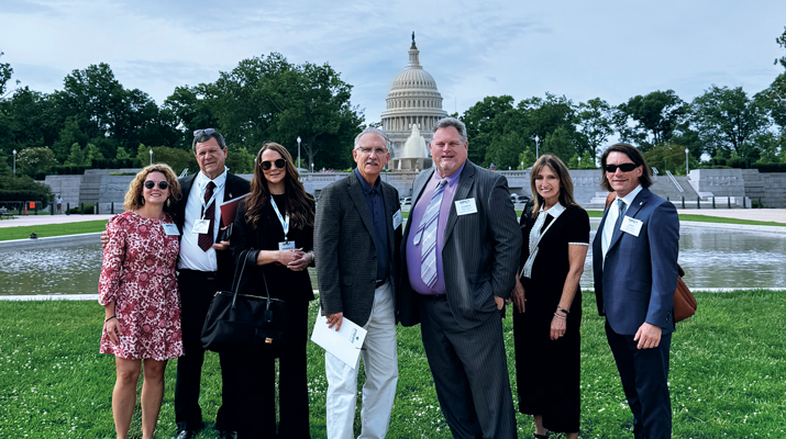 Members of the Pennsylvania Propane Gas Association find themselves with a good backdrop for this photo. (Photo courtesy of John Eddinger)