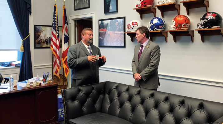 Mike Sharkey, left, of The Energy Cooperative visits with Rep. Troy Balderson, R-Ohio. (Photo: LP Gas staff)