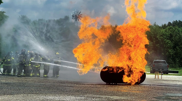Firefighters encounter a live burn. (Photo courtesy of Superior Energy Systems)