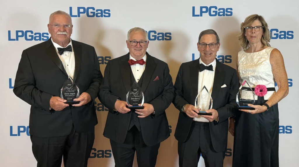 (From left) Denis Gagne, Bob Barry, Joe Armentano and Susie Cusnia, who accepted the award on behalf of her brother, Brian Sheehan.
