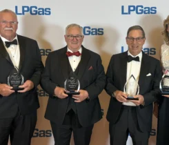(From left) Denis Gagne, Bob Barry, Joe Armentano and Susie Kuznia, who accepted the award on behalf of her brother, Brian Sheehan.