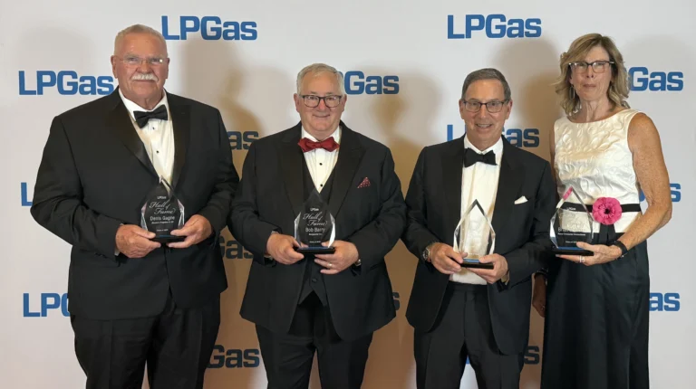(From left) Denis Gagne, Bob Barry, Joe Armentano and Susie Kuznia, who accepted the award on behalf of her brother, Brian Sheehan.