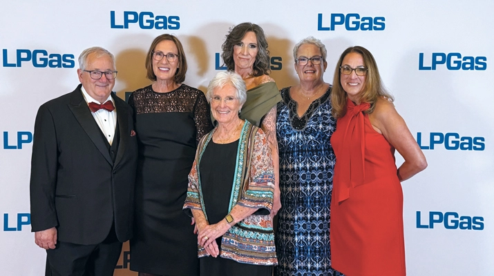 Inductee Bob Barry, left, and his family gather together for a photo after the Hall of Fame dinner. (Photo by LP Gas Staff)