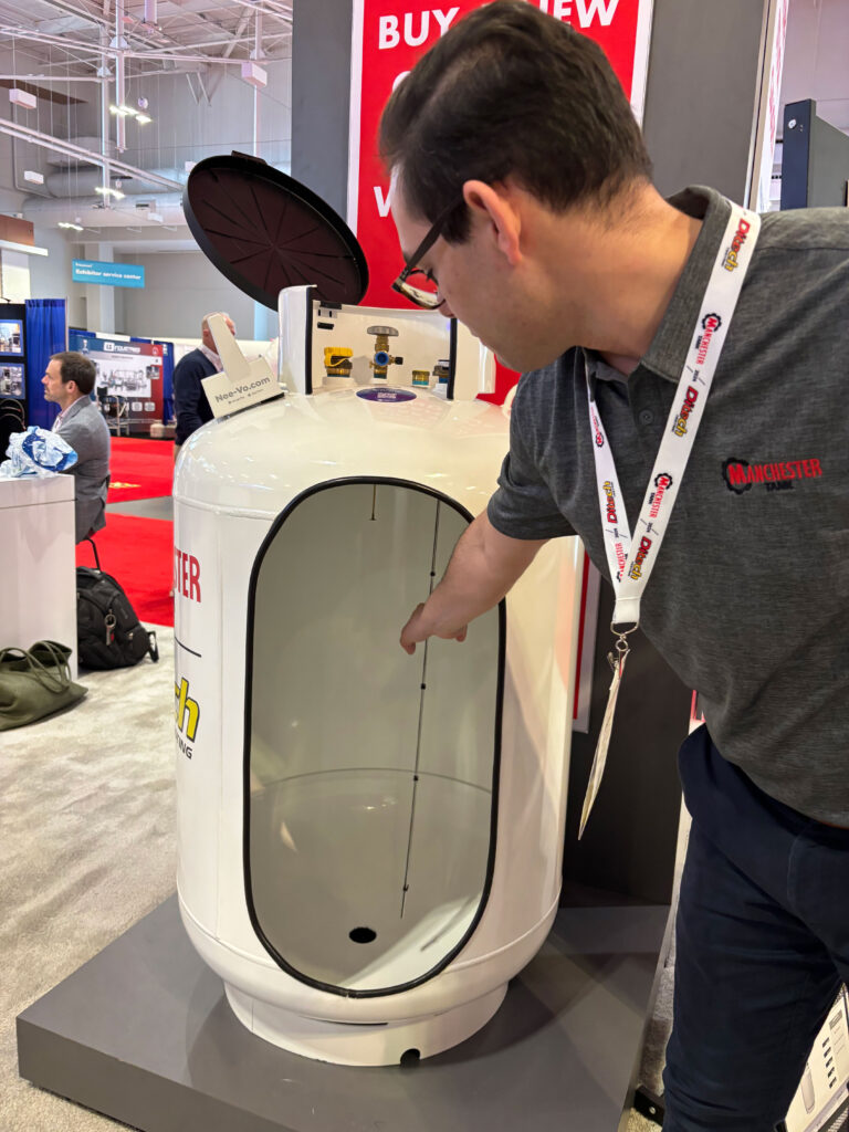 Photo of Manchester Tank President Jordan de Lima showing the company's digital gauge