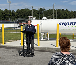 Onslow County Schools Superintendent Chris Barnes speaks at a ceremony welcoming the new propane buses. (Photo courtesy of Roush CleanTech)