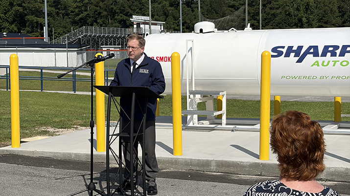 Onslow County Schools Superintendent Chris Barnes speaks at a ceremony welcoming the new propane buses. (Photo courtesy of Roush CleanTech)