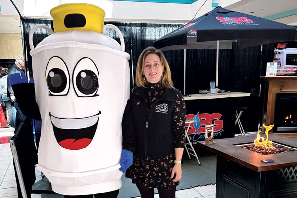 Shaffer poses with Frank the Tank at the Somerset County Megashow, where Shaffer’s displayed its products. (Photo courtesy of Lucy Shaffer)